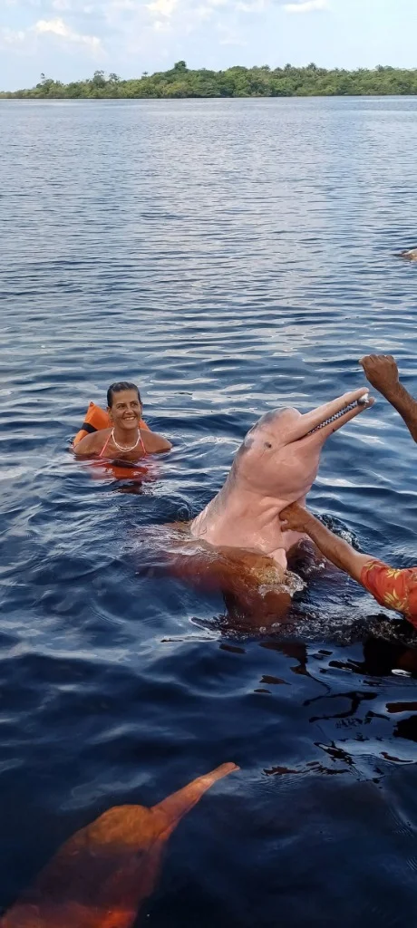 Swimming with Pink River Dolphins - Anna L